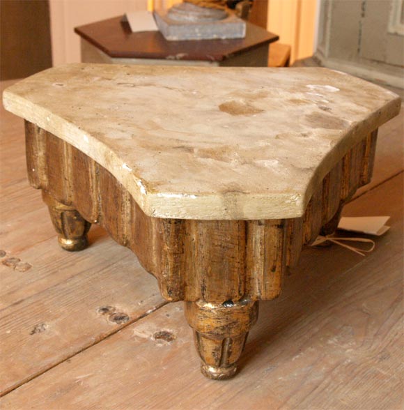 Three legged plinth