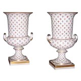 Pair of  painted and gilt porcelain urn vases