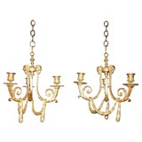 Pair of Regency gilt bronze, left and right facing chandeliers