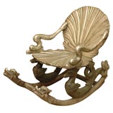 An Italian Silvered and Carved Wood “Grotto” Rocking Armchair