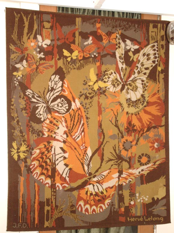 Aubusson tapestry representing flowers and butterflies signed by Herve Lelong.