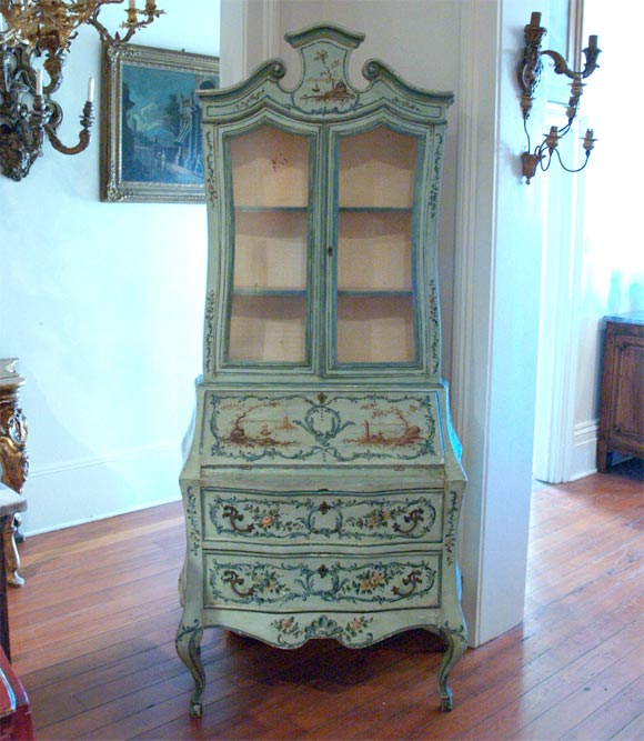 19th c. Painted secretary bookcase. Wonderfully shaped bombe base wtih a shaped top with 2 glass doors (glass is hand laid and slightly opaque).