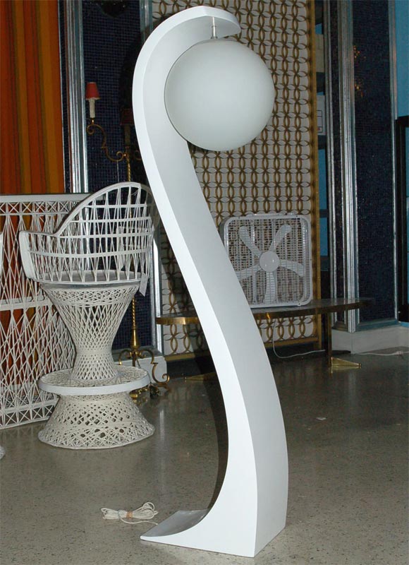 Signed and dated Modeline of California cobra floor lamp. Base bears date stamp of 1973.  Refinished in a semi-gloss white lacquer, it retains it's original heavy white glass globe. 24 HOUR HOLD ONLY.