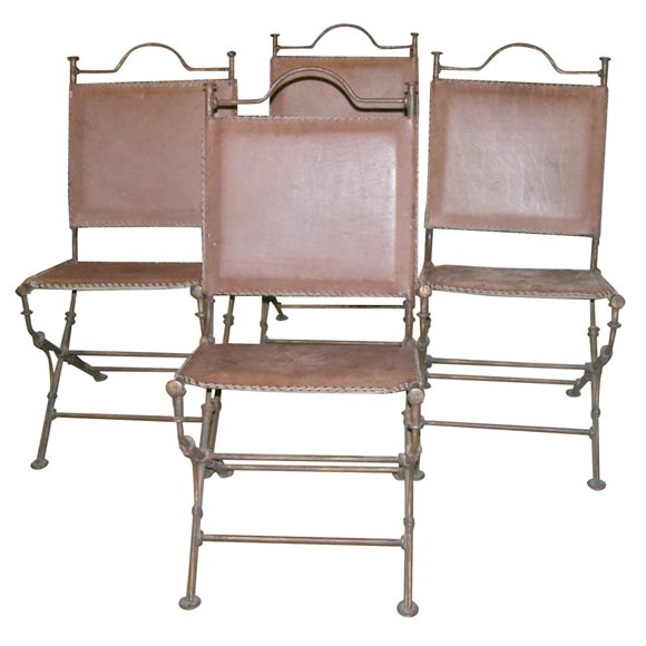 Set of four French wrought iron chairs