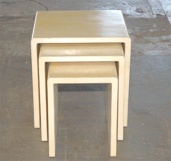 Contemporary Set of three parchment nesting tables