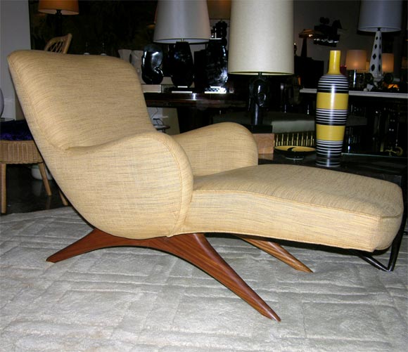 Walnut upholstered chaise by Vladimir Kagan, American 1950s<br />
30” w at back, arm width reduces to 28” w, 23” w at the foot of the chaise, 58” l, 17” h to seat, 35” back height.