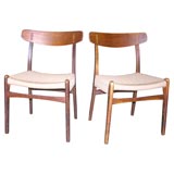 Set of 4 Hans Wegner teak dining chairs with woven seats