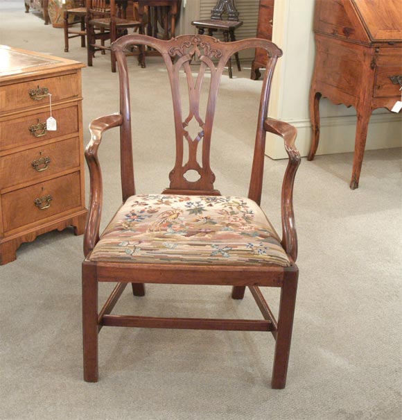 Antique English mahogany elbow chairs with needlepoint