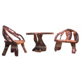 Used set of matching natural wood growth chairs and table
