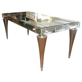A mirrored cocktail table