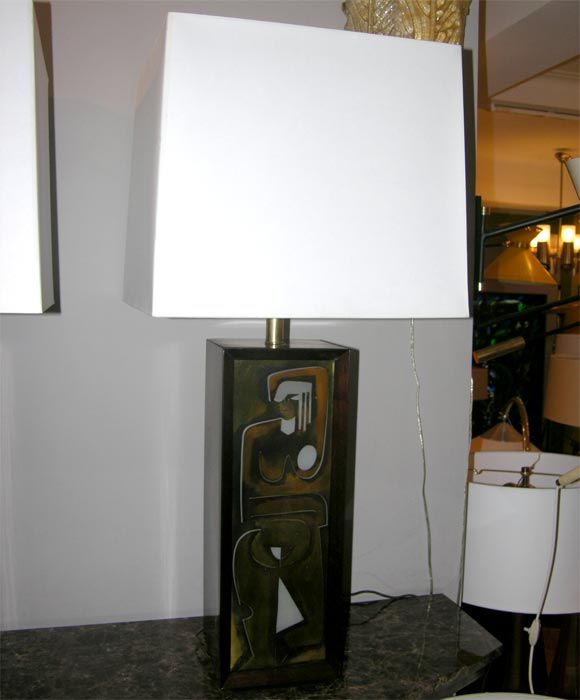 A pair of modernist table lamps with illuminated abstract male and female torsos
Shades not included.