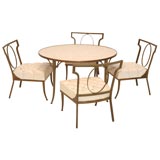 A Patinated Bronze Capiz Shell Game Table and Four Chairs