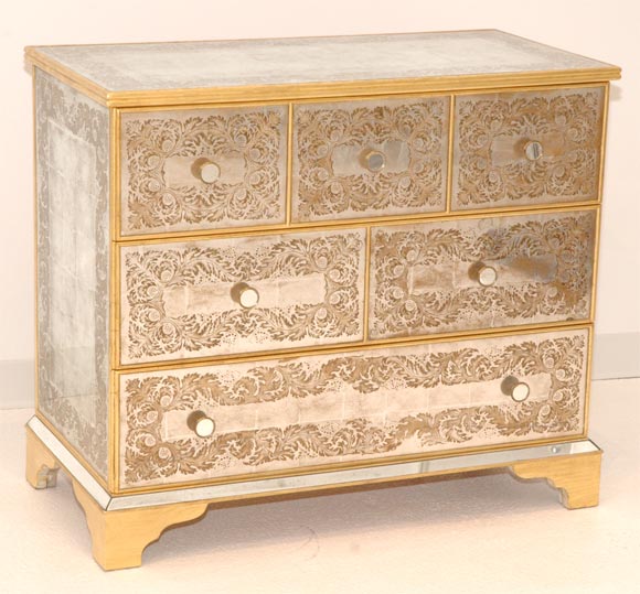 A Verre Eglomise Chest of Drawers