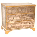 A Verre Eglomise Chest of Drawers
