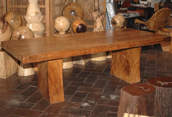 Custom designed teak dining table. Extra thick top and base legs made from old wood planks. This thickness of teak no longer available other than from recycled woods.