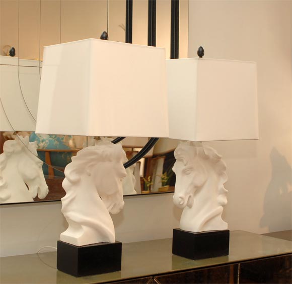 Pair of Horse head form table lamps in a gesso plaster finish. Shades not included.