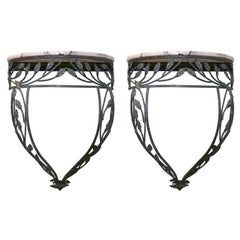 A Pair of French Iron Foliate and Marble Console Tables