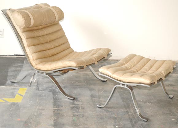chair and ottoman by Arne Norell upholstered in tan leather, 1950's