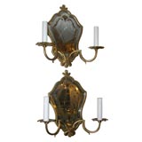 Pair of verre eglomise mirrored two-arm sconces