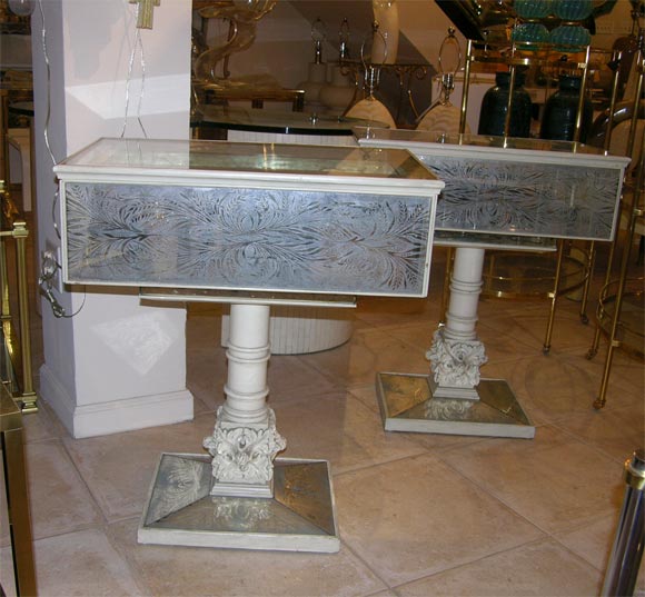 Pair of silver leaf pedestal side tables