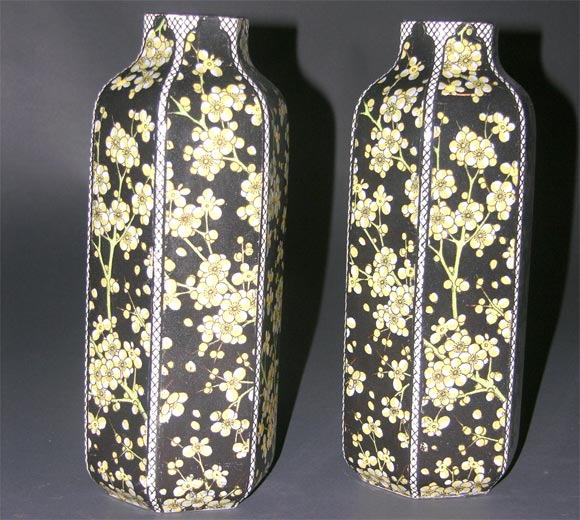 Pair of Royal Doulton decorated porcelain vases
