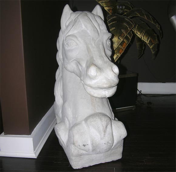 concrete horse head statue