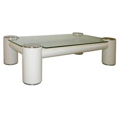 A White Lacquered and Glass Coffee Table.
