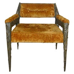 A Paul Evans Upholstered Resin and Steel Armchair.