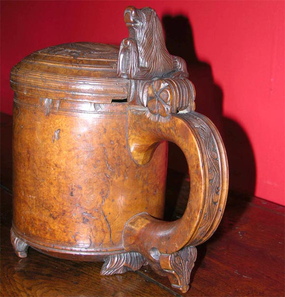 Wonderful Norwegian peg tankard, fashioned from burl Birch, the lid and handle with lion carving, stylized ground.