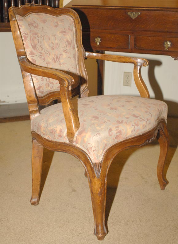 Italian rococo walnut armchair