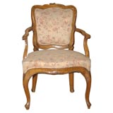 Italian rococo walnut armchair