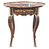 Small Italian faux grained table with gilt accents