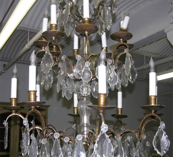 Pair of Crystal and Bronze 4-Tiered Chandeliers by Jansen For Sale 2