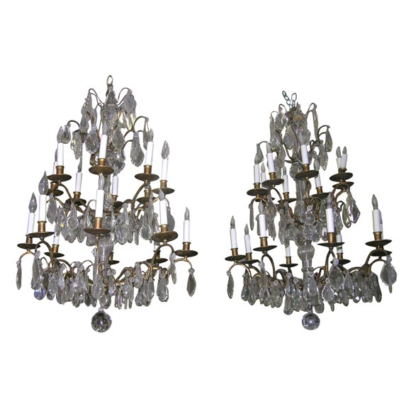 Pair of Crystal and Bronze 4-Tiered Chandeliers by Jansen For Sale