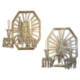 A pair of octagonal two light wall sconces