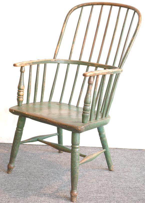 19THC ORIGINAL GREEN PAINTED SACK BACK WINDSOR ARMCHAIR IN PRISTINE CONDITION FROM A EARLY ESTATE IN PRISTINE CONDITION WITH EXTENDED ARMS AND WONDERFUL PATINA.GREAT EARLY FORM AND SURFACE.PROBABLY FROM NEW ENGLAND.