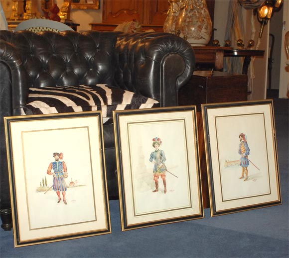 Framed hand-colored studies of soldiers in formal military attire.