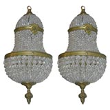 Pair of small scale beaded glass and brass chandeliers