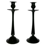 Pair of black glass candlesticks