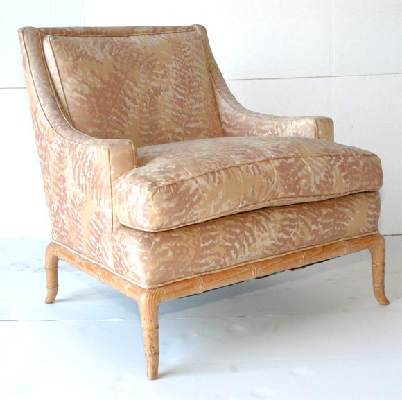 Original T.H. Robsjohn-Gibbings occaisional chair with carved oak faux bamboo base and legs in a light ceruse finish.  Completely reupholstered in a Randolph and Hein fabric. Loose down seat cushion.