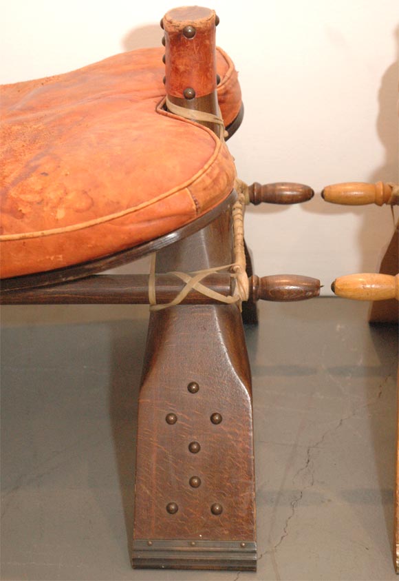 Pair of Camel Saddle Stools 1