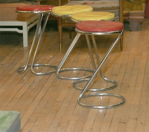 Tubular chromed steel Z stools designed by Gilbert Rhode.