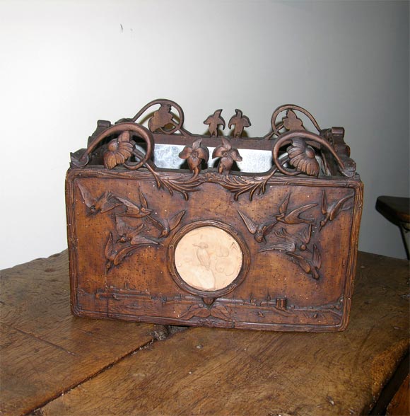 This beautiful planter was made to order by a French artisan as a wedding gift for a French Nobility.  The hand carved terra cotta cameos of storks and songbirds symbolize good fortune and happiness. The inside has a tin liner.