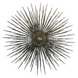 An Iron Starburst Wall Hanging probably by William Bowie.