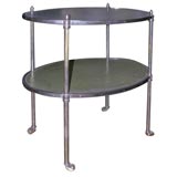 Regency style two tier brass end table with green leather top