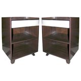 Pair of mahogany & leather end tables by Gilbert Rohde