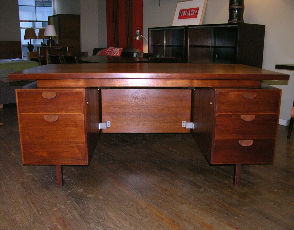 Jens Risom walnut desk with floating top and bent wood handles