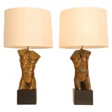 A Pair of Cast Metal Male Torso Table Lamps with Linen Shades