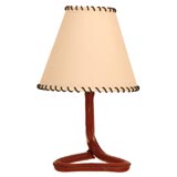 A Jacques Adnet Table Lamp in Red Leather