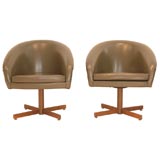 A Pair of Swivel Chairs designed by Milo Baughman